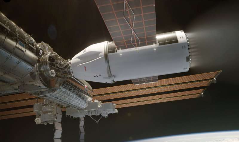 This image provided by SpaceX shows an artistic rendering of the powerful capsule that will be used, once developed, to bring the International Space Station down through the atmosphere in January 2031. NASA and Elon Musk's company on Wednesday, July 17, 2024, outlined the plan to burn the space station up on reentry and plunge what's left into the ocean, ideally at the beginning of 2031 when it hits the 32-year mark. Credit: SpaceX via AP How NASA and SpaceX will bring down the space station when it's retired